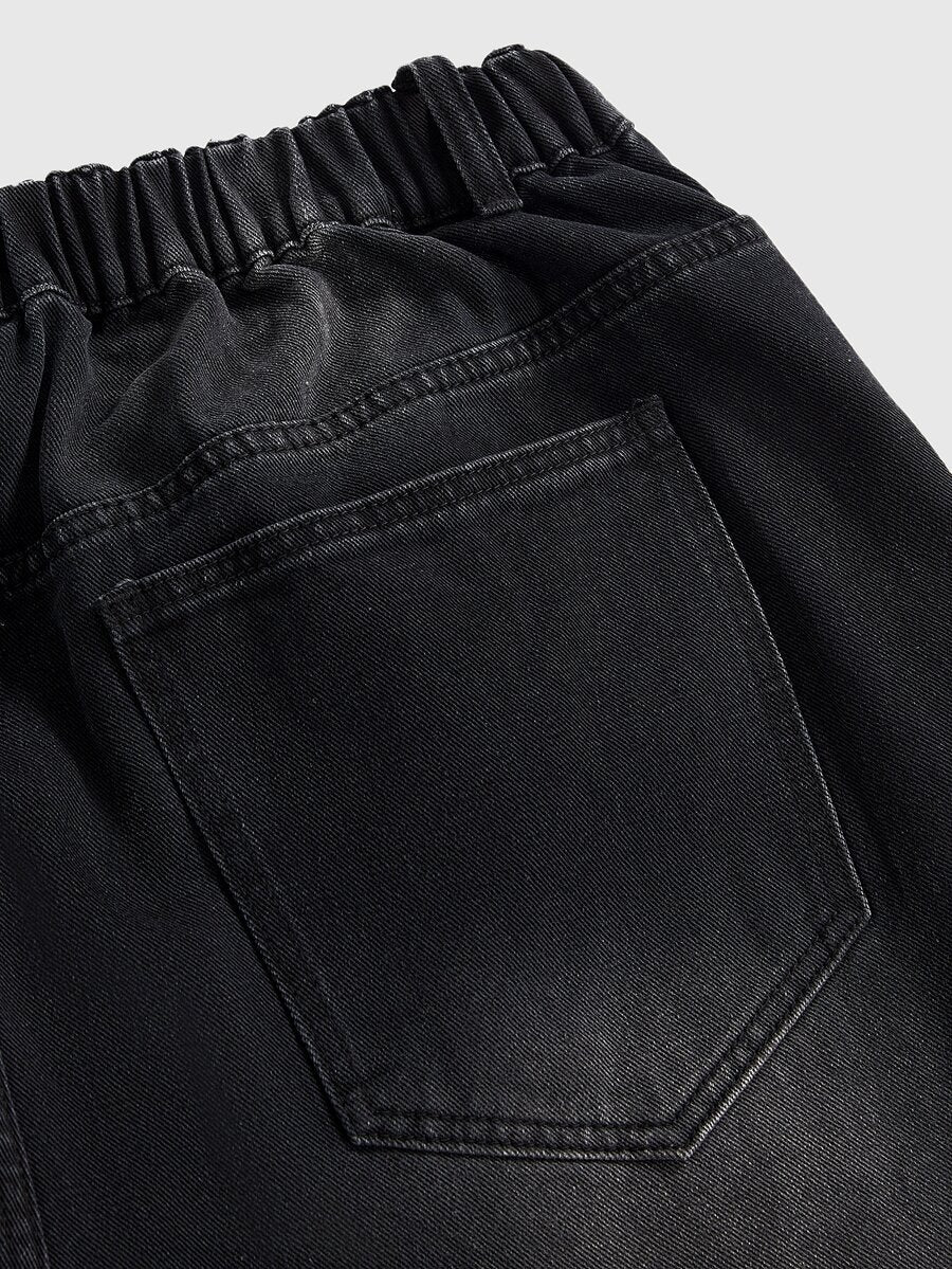 Women's gothic cross print baggy wide leg jeans made from denim with zipper fly and loose fit.
