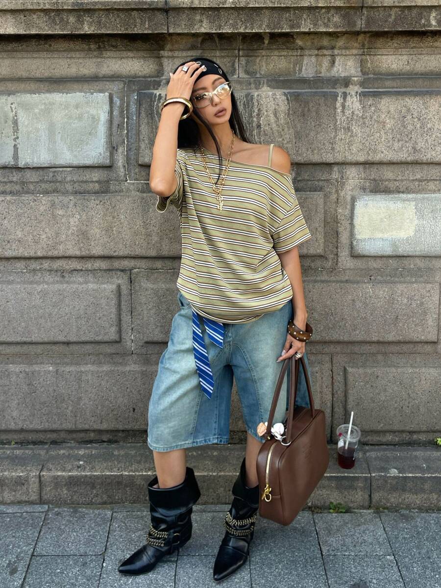Women's casual loose fit cold shoulder cotton t-shirt with asymmetrical cutout neckline and short sleeves.