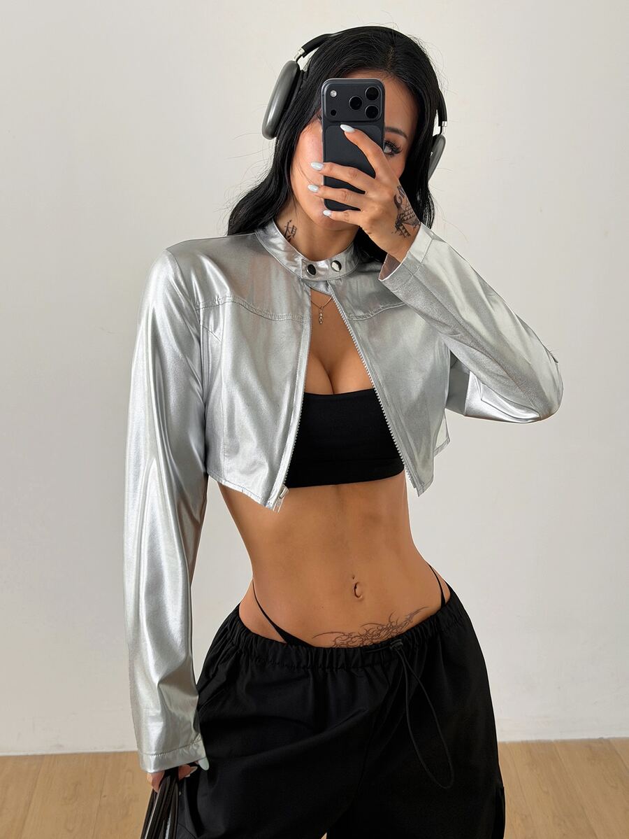 Women's metallic silver cropped lightweight zip-up jacket with long sleeves and a stand collar.