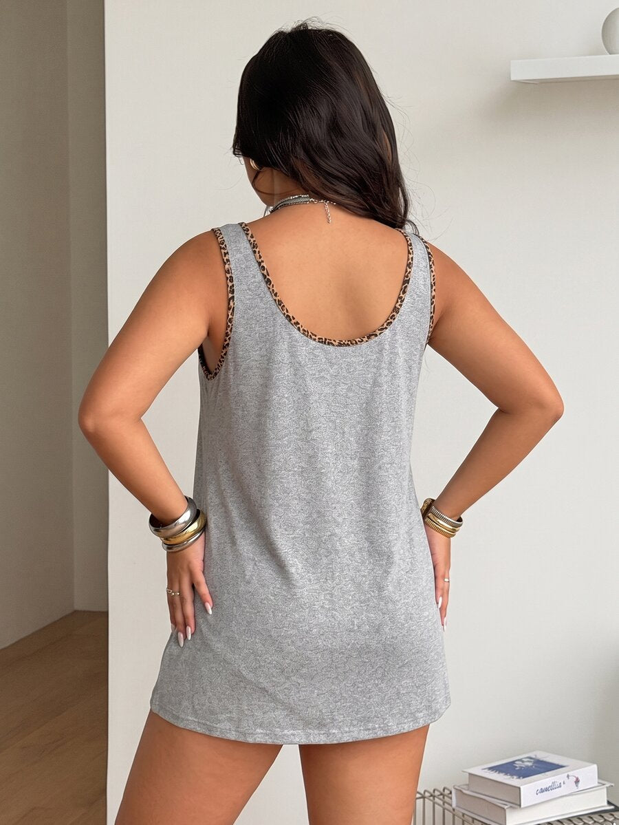 Women's camouflage print tank top featuring a scoop neckline and knitted stretch fabric in army green.