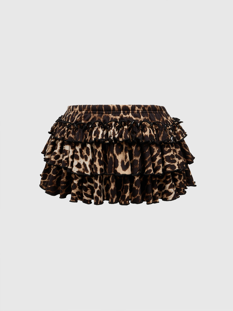 Women's low waist tiered mini skirt featuring ruffled hem layers in knitted stretch fabric.