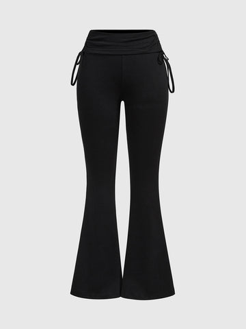Women's low waist flare leg pants featuring an elastic drawstring waistband and ruched detail in knitted fabric.