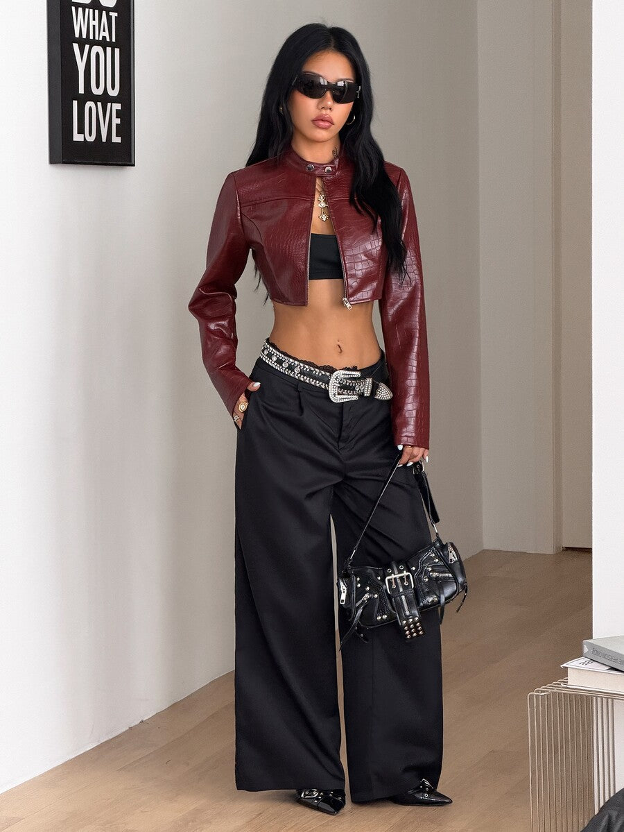 Women's metallic grey cropped faux leather jacket featuring a stand collar and asymmetrical zip front closure.