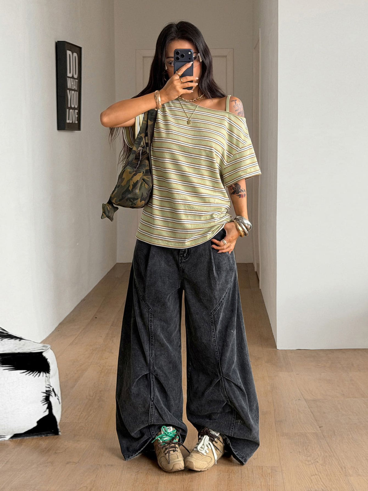 Women's casual loose fit cold shoulder cotton t-shirt with asymmetrical cutout neckline and short sleeves.