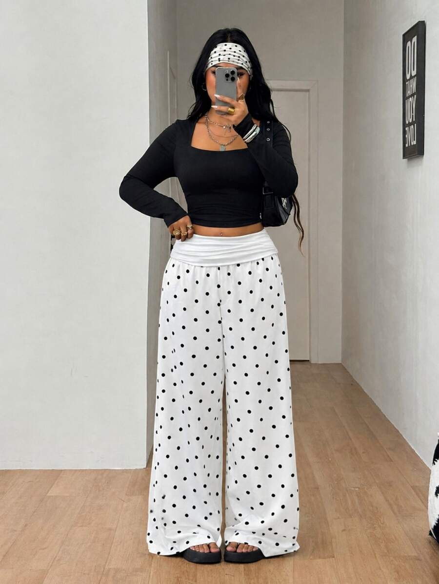 Women's plus size wide leg cotton pants featuring a relaxed loose fit and high waist design.