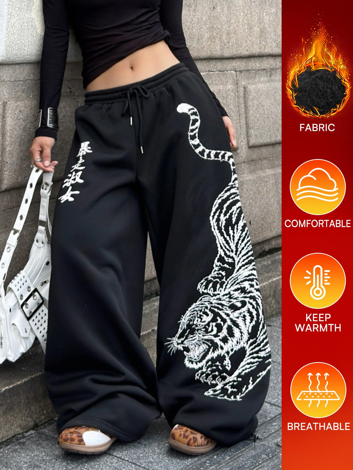 Women's loose fit wide leg graphic sweatpants in light grey with an elastic drawstring waistband