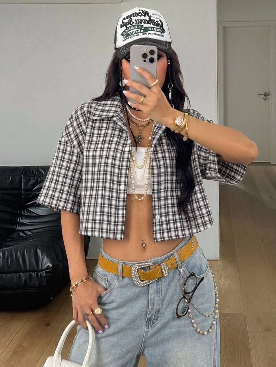Women's plaid crop shirt with button front, chest pocket, short sleeves, and loose casual fit.