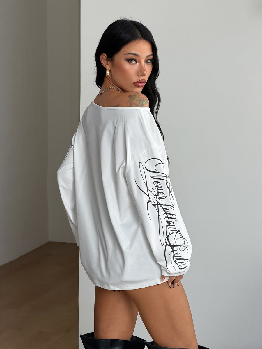 Women's brown striped boat neck long sleeve raglan T-shirt with a loose casual fit