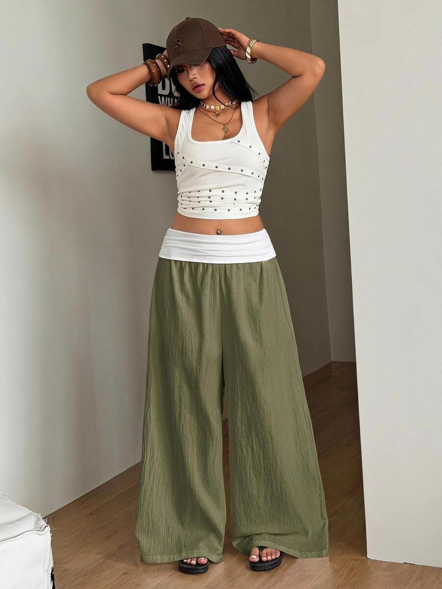 Women's plus size wide leg cotton pants featuring a relaxed loose fit and high waist design.