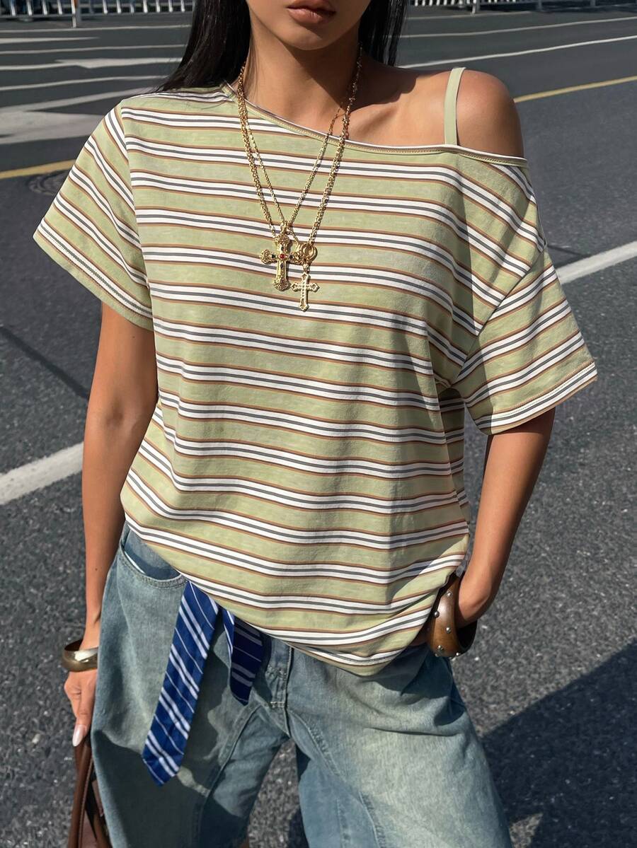 Women's casual loose fit cold shoulder cotton t-shirt with asymmetrical cutout neckline and short sleeves.