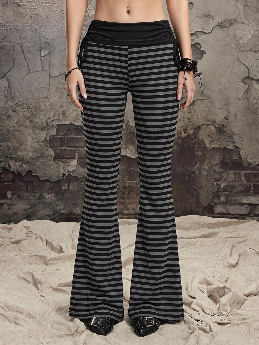 Women's low waist flare leg pants featuring an elastic drawstring waistband and ruched detail in knitted fabric.