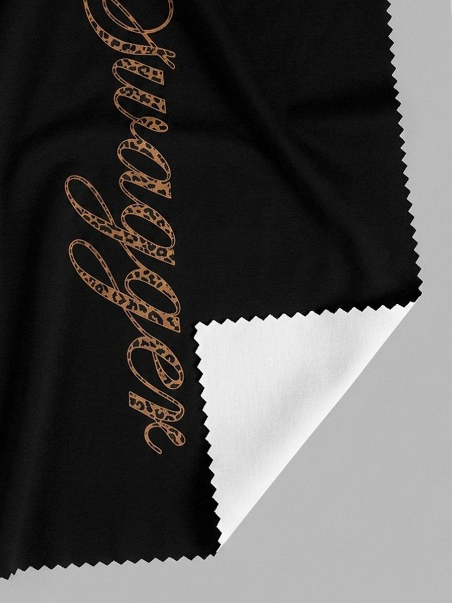 Women's casual straight leg sweatpants featuring a black and white polka dot design with an elastic waistband.