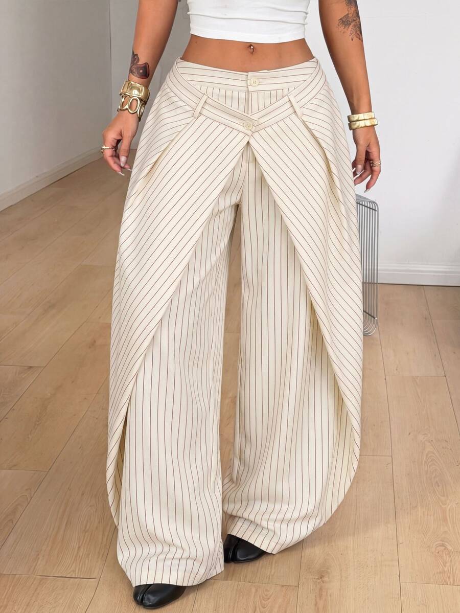 Women's loose fit pleated wide leg pants in royal blue pinstripe woven fabric with zipper fly closure.