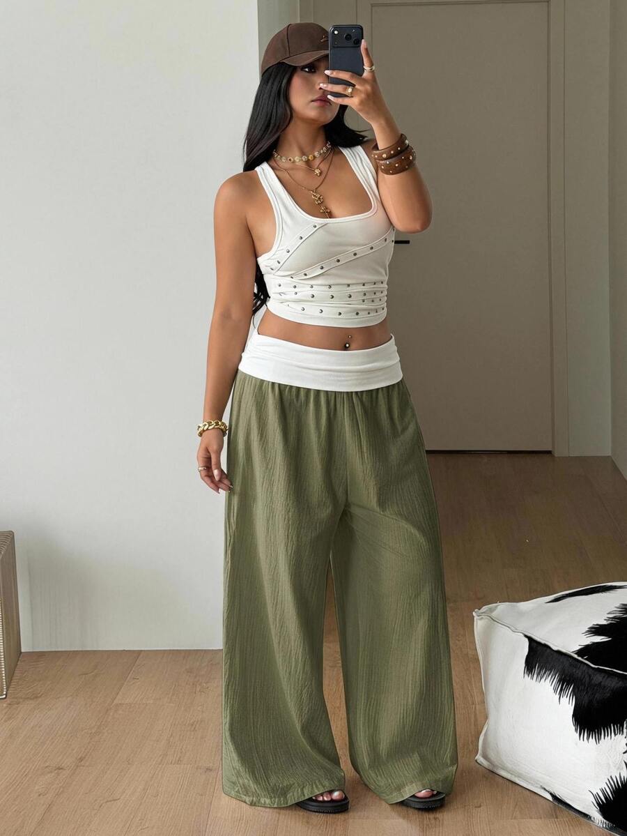 Women's plus size wide leg cotton pants featuring a relaxed loose fit and high waist design.