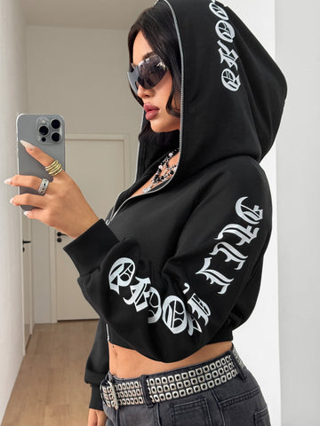 Black zip up hooded sweatshirt featuring Halloween graphic print, drawstring hood, long sleeves, and front zipper closure.