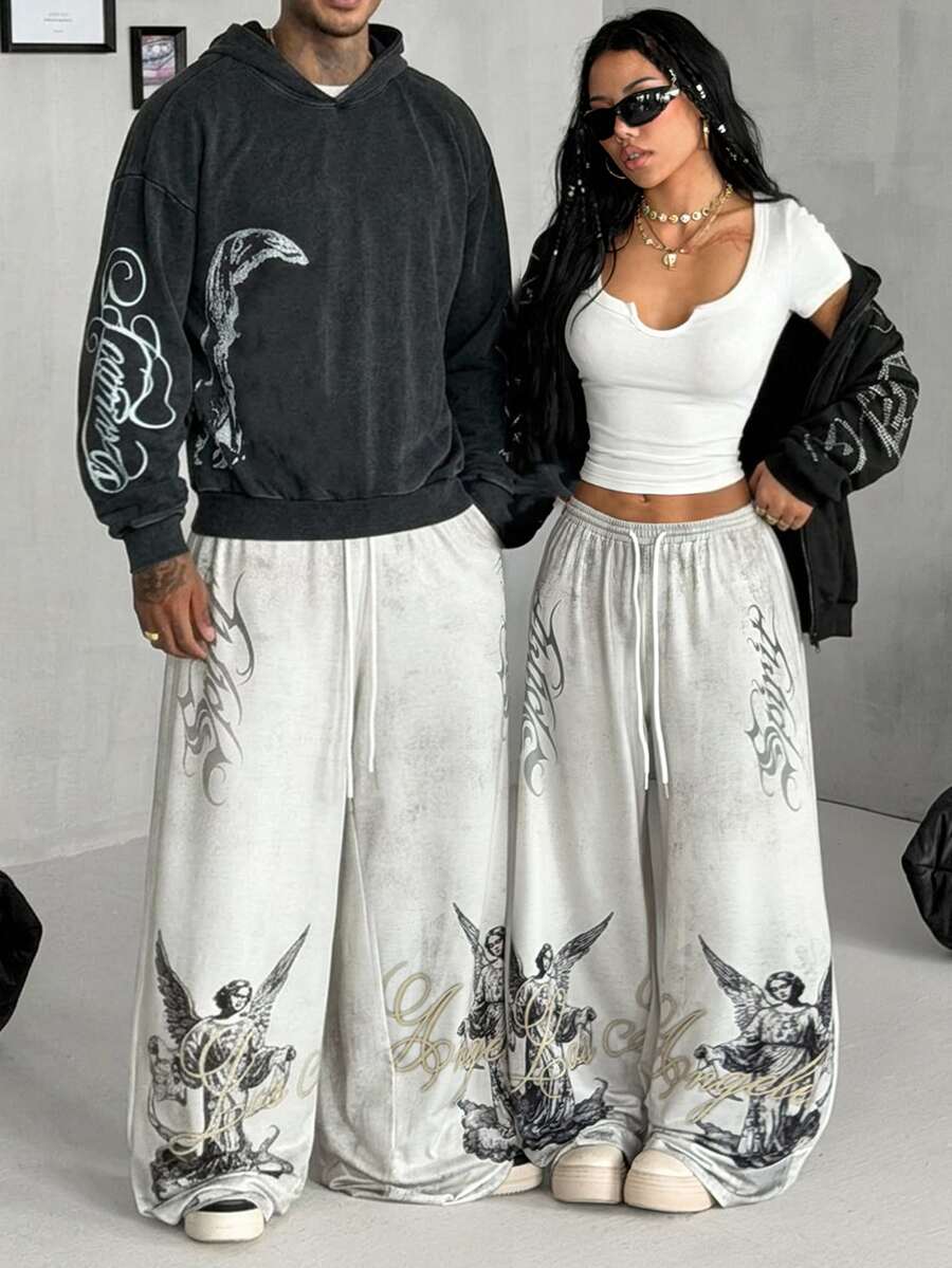 Women's loose fit wide leg graphic sweatpants in light grey with an elastic drawstring waistband