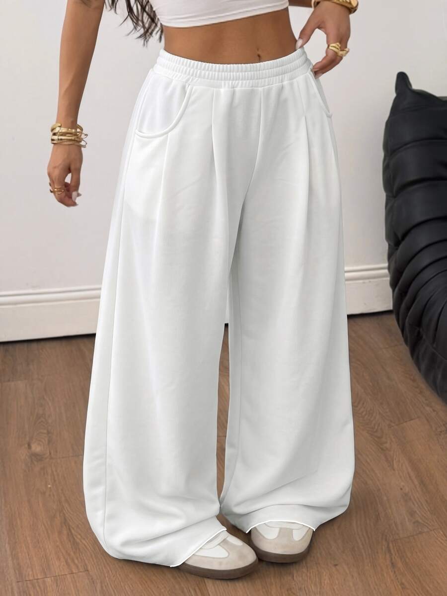 Women's loose wide leg casual sweatpants with an elastic waistband and side pockets