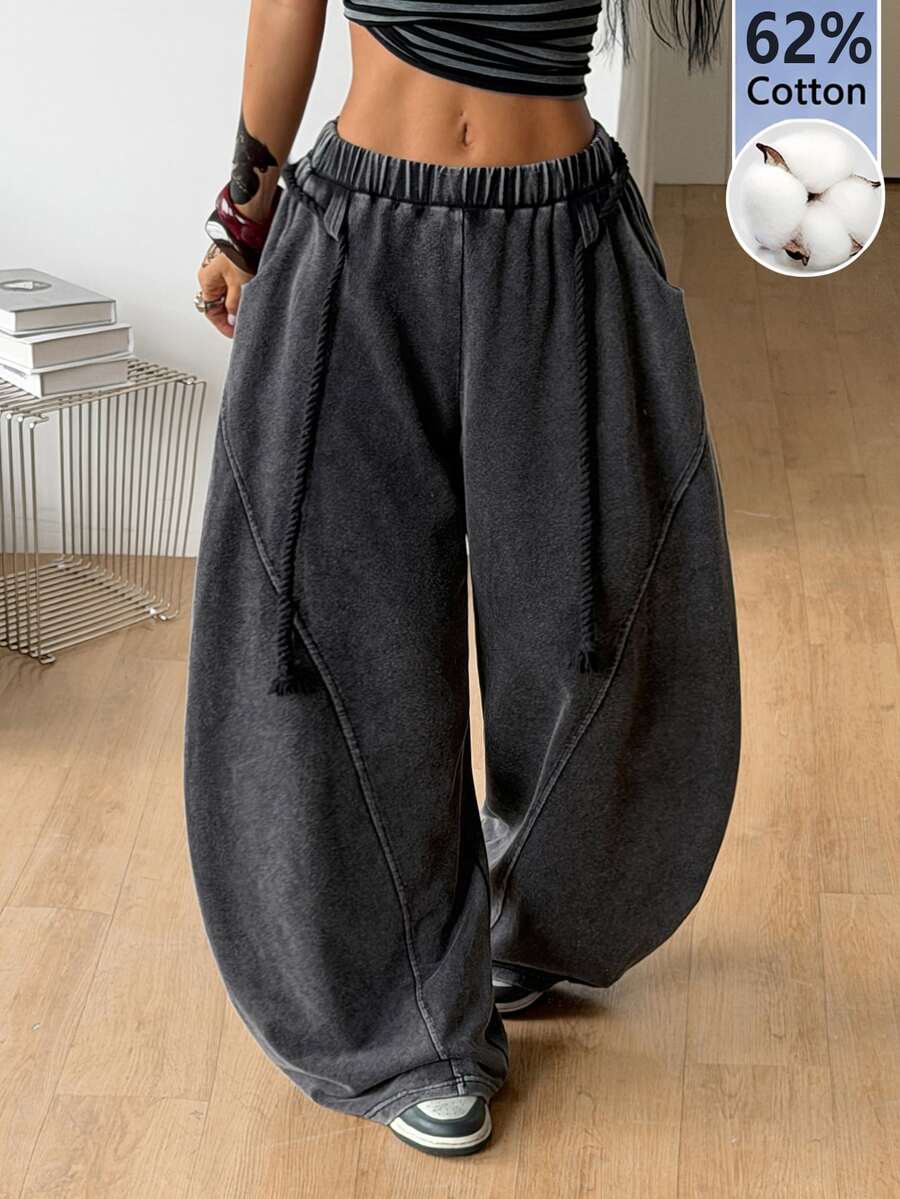 Women's casual grey plaid sweatpants featuring an elastic drawstring waistband, side pockets, and a relaxed loose fit.