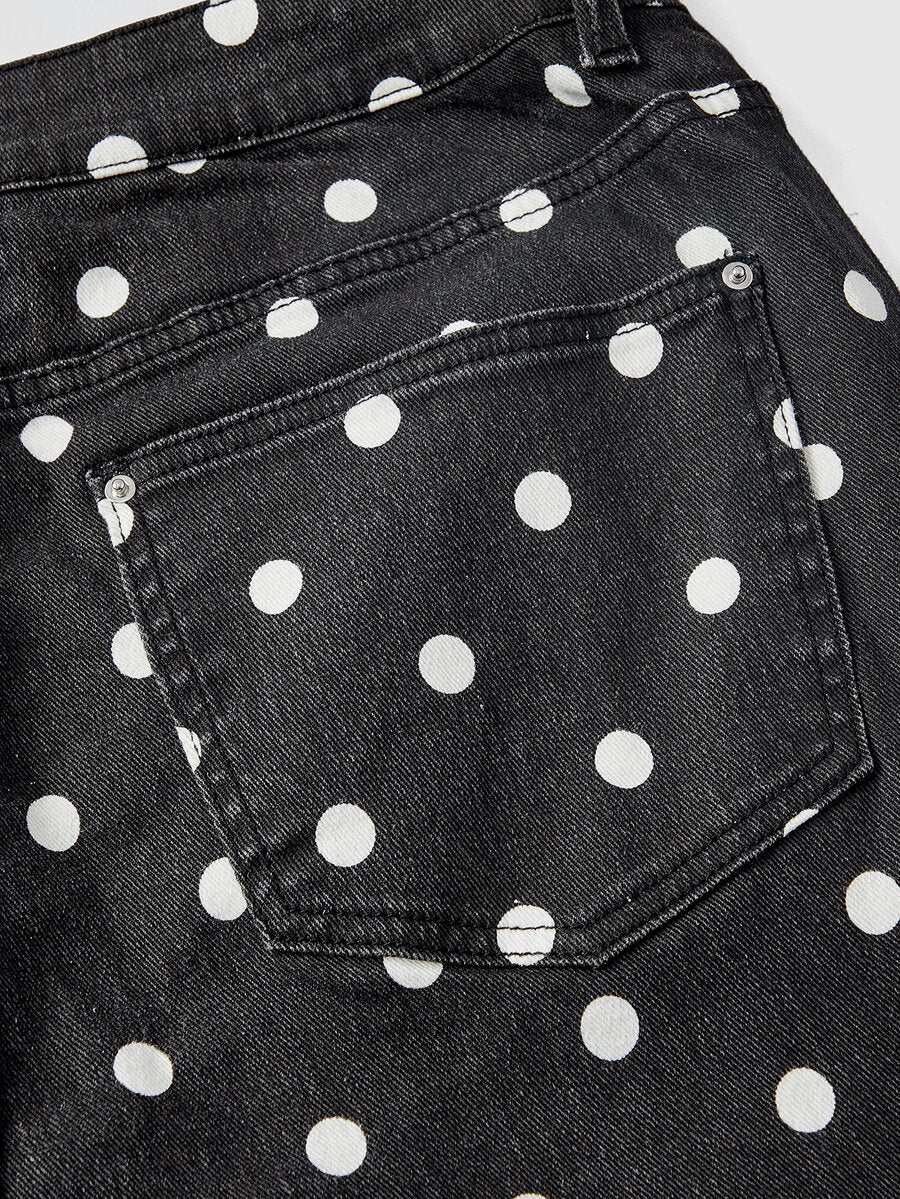 Women's skinny denim capri pants featuring an allover leopard and floral print with button and zipper closure