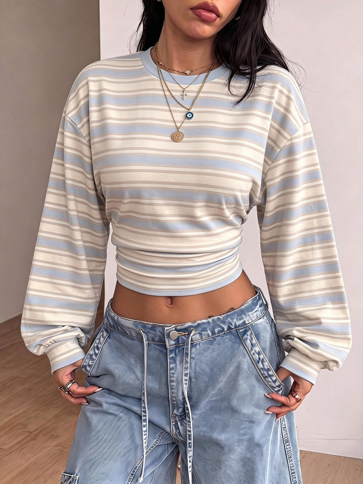 Women's brown waist-cinching sweatshirt featuring a round neck, drop shoulder long sleeves, and rib-knit cuffs.