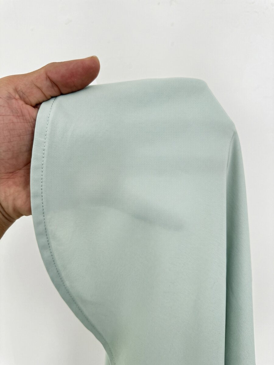 Women's casual button up shirt with half sleeves, classic shirt collar, and chest pocket in a woven fabric.