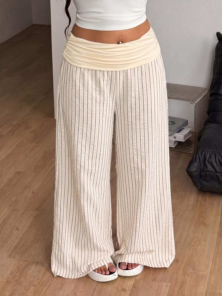 Women's plus size wide leg cotton pants featuring a relaxed loose fit and high waist design.