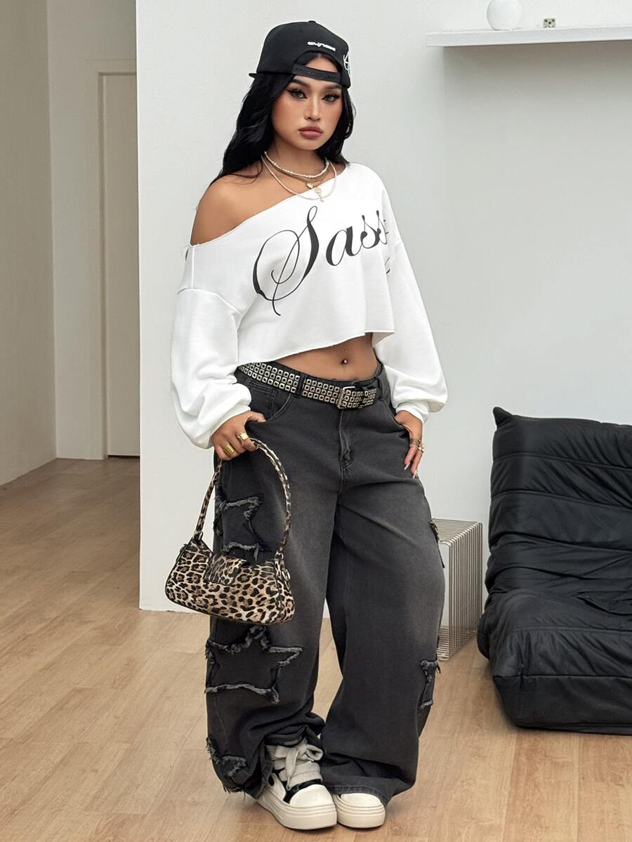 Plus size women's cropped leopard print sweatshirt featuring an asymmetrical neckline and long drop-shoulder sleeves.