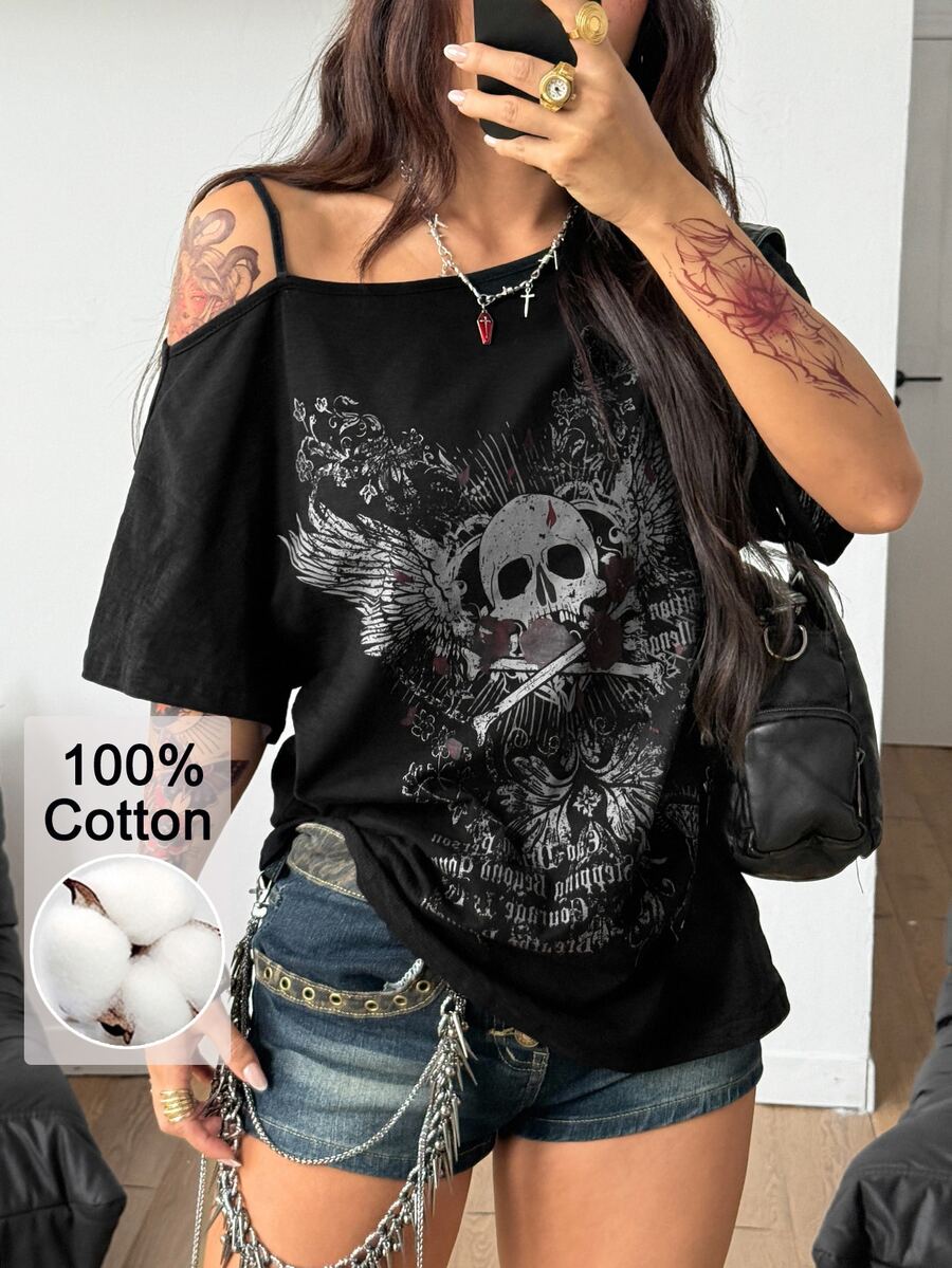 Women's loose-fit black cotton oversized t-shirt featuring an asymmetrical cold shoulder cutout neckline and short drop-shoulder sleeves.