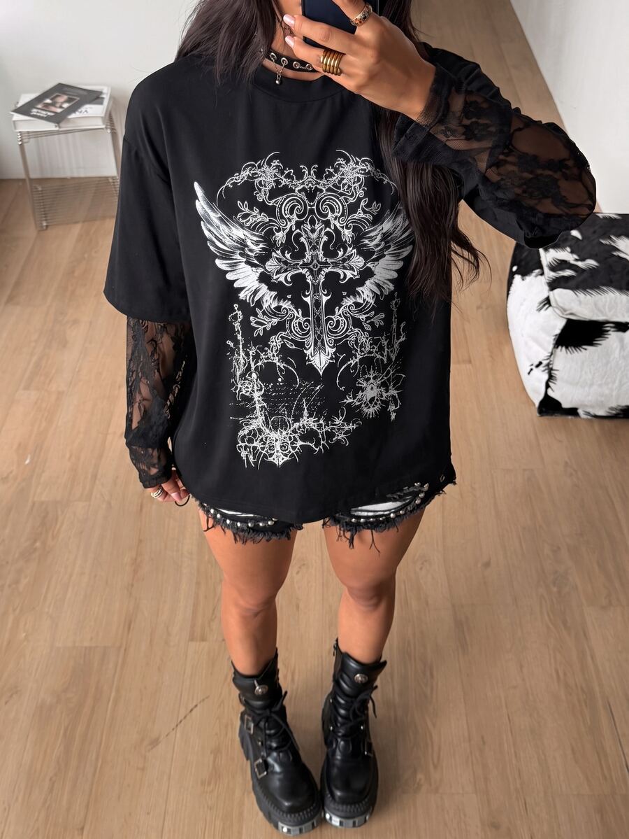 Women's casual graphic long sleeve t-shirt with a round neck, drop shoulder sleeves, and loose relaxed fit.