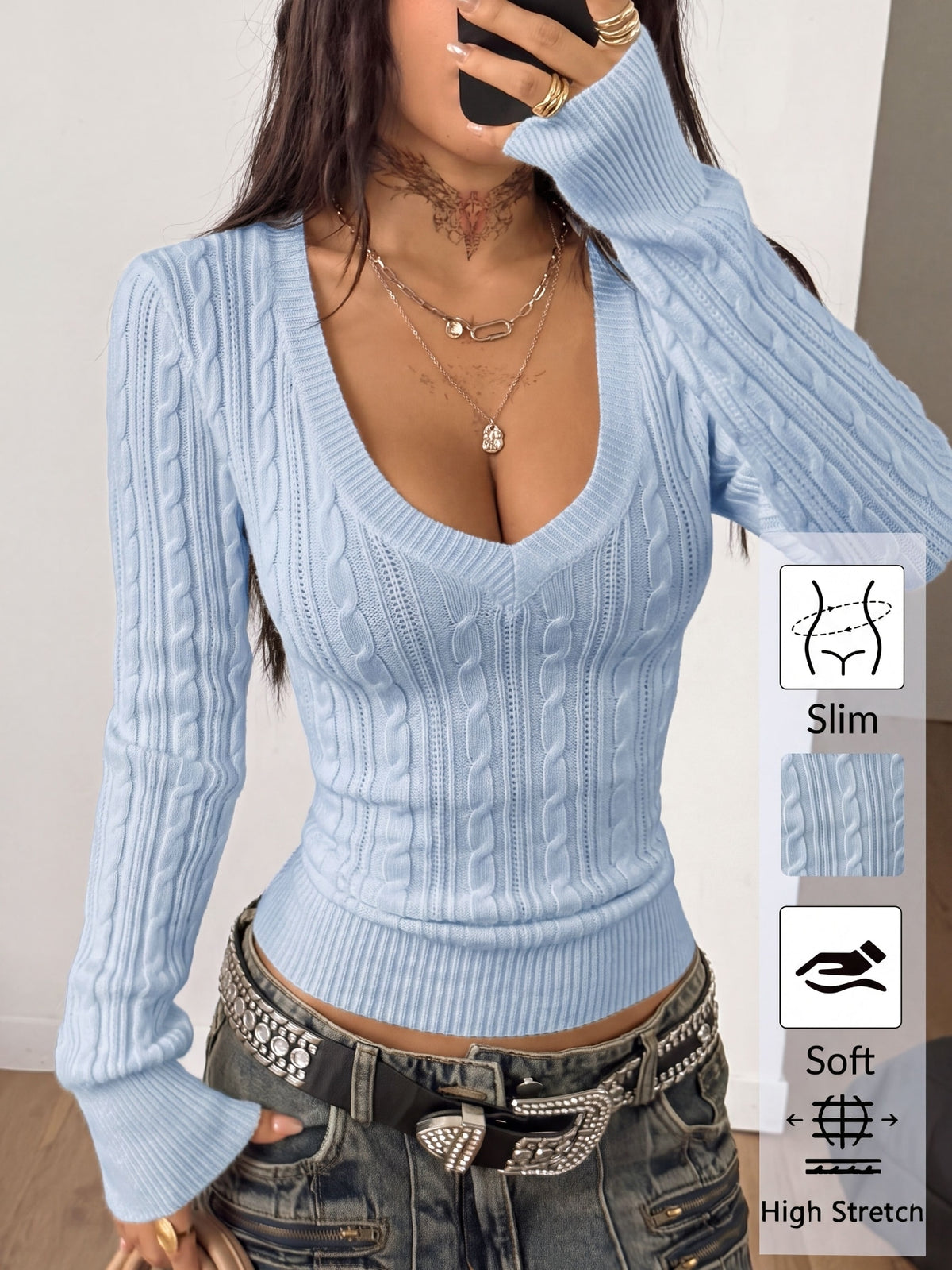 Women's slim fit cable-knit sweater with a V-neckline and long sleeves in solid green rib knit fabric.