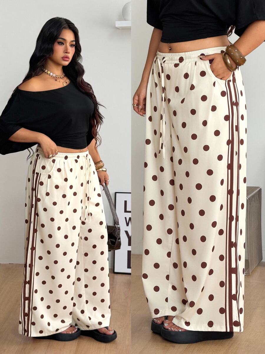 Women's loose straight leg cotton pants featuring a high waist with an adjustable drawstring knot and functional side pockets.