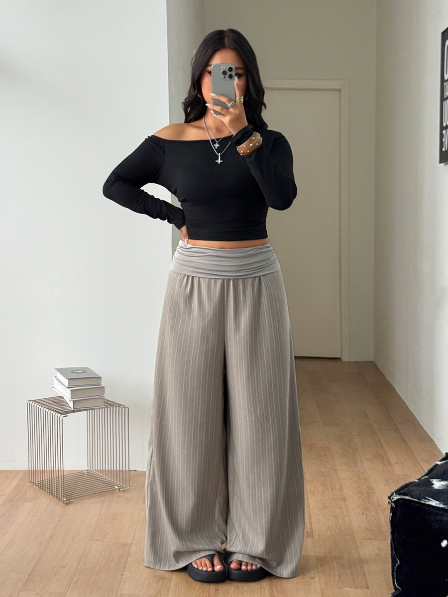 Women's plus size wide leg cotton pants featuring a relaxed loose fit and high waist design.