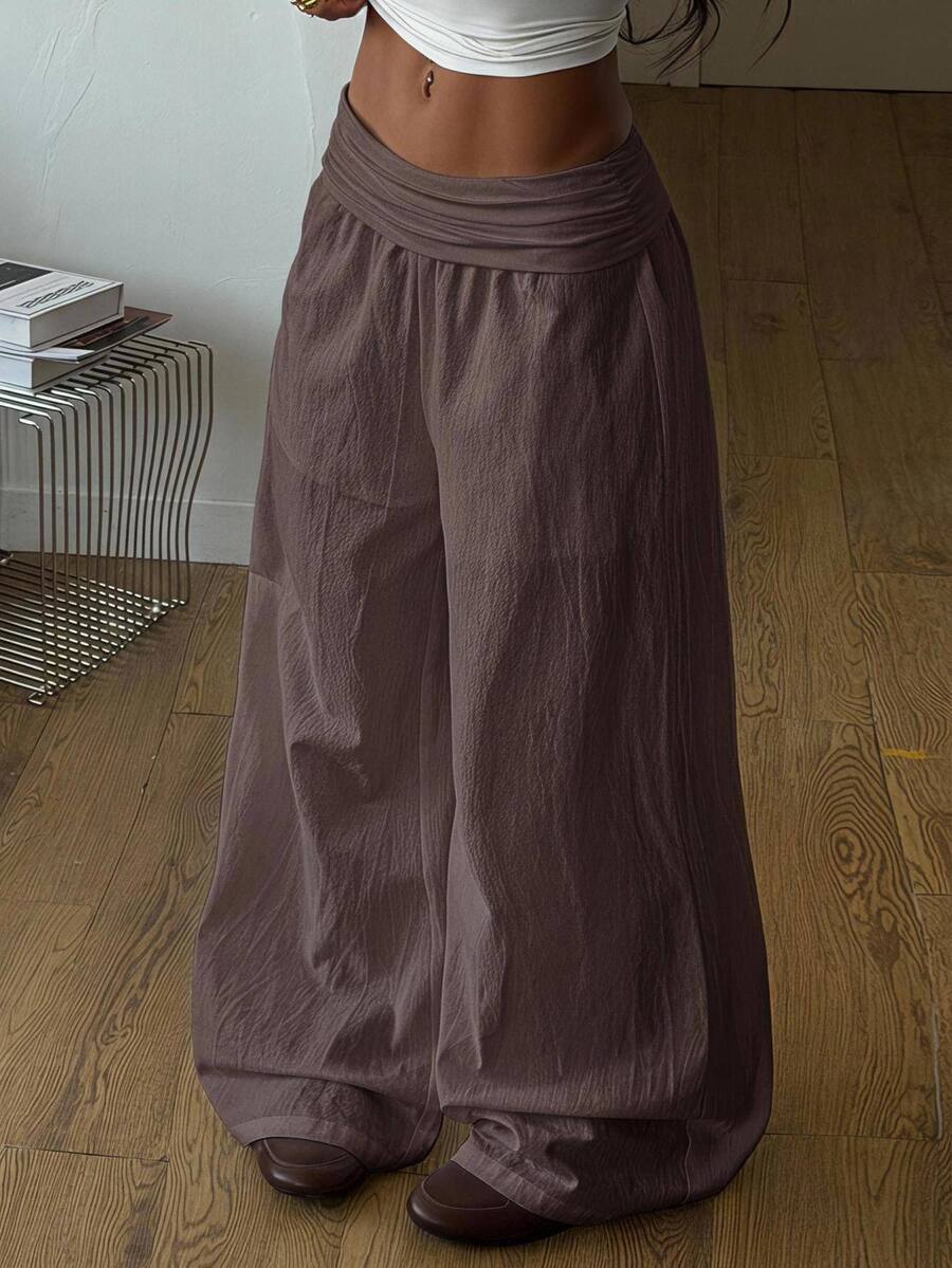 Women's plus size wide leg cotton pants featuring a relaxed loose fit and high waist design.