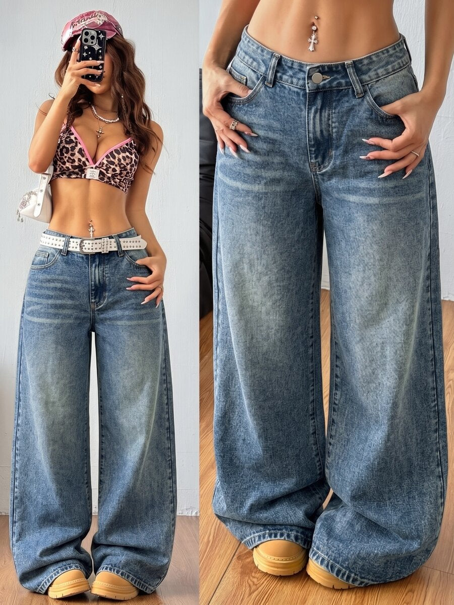 Women's relaxed fit wide leg denim jeans with pockets and a zipper fly.