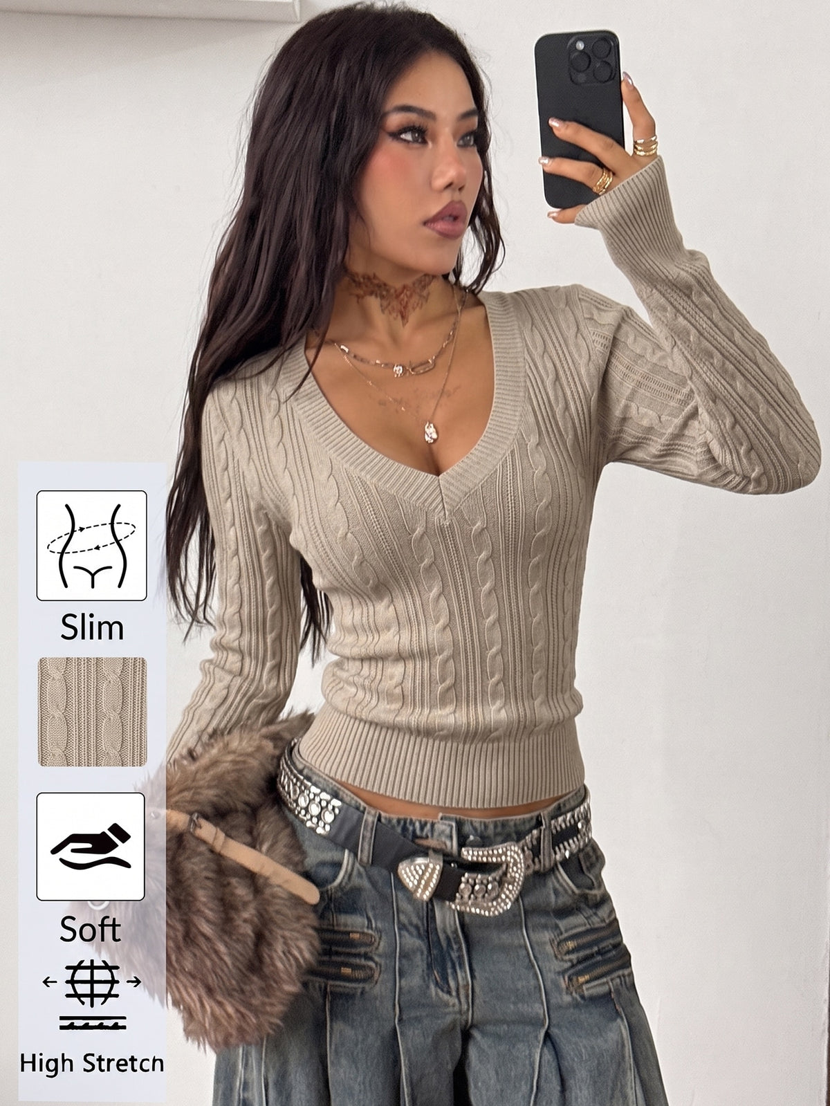 Women's slim fit cable-knit long sleeve sweater featuring a V-neckline and ribbed knit details.