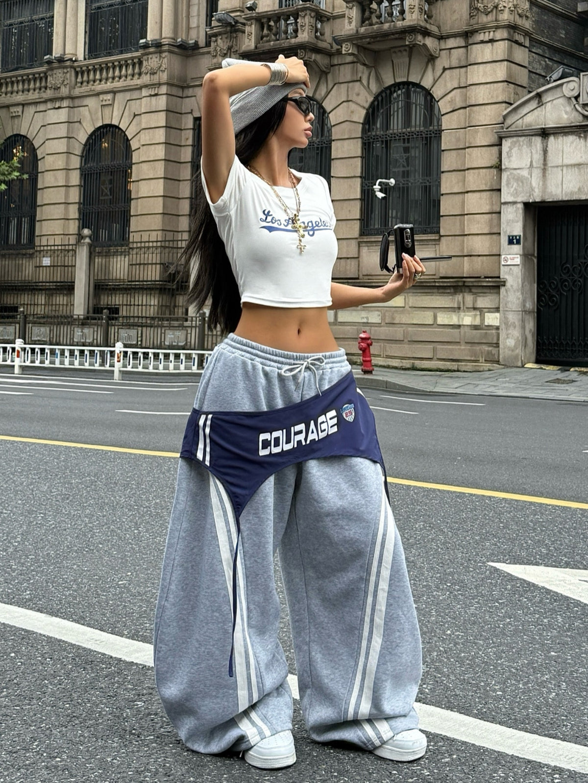 Women's casual grey plaid sweatpants featuring an elastic drawstring waistband, side pockets, and a relaxed loose fit.