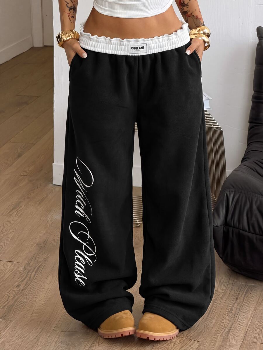 Women's striped straight leg casual trousers with elastic mid waist and side pockets