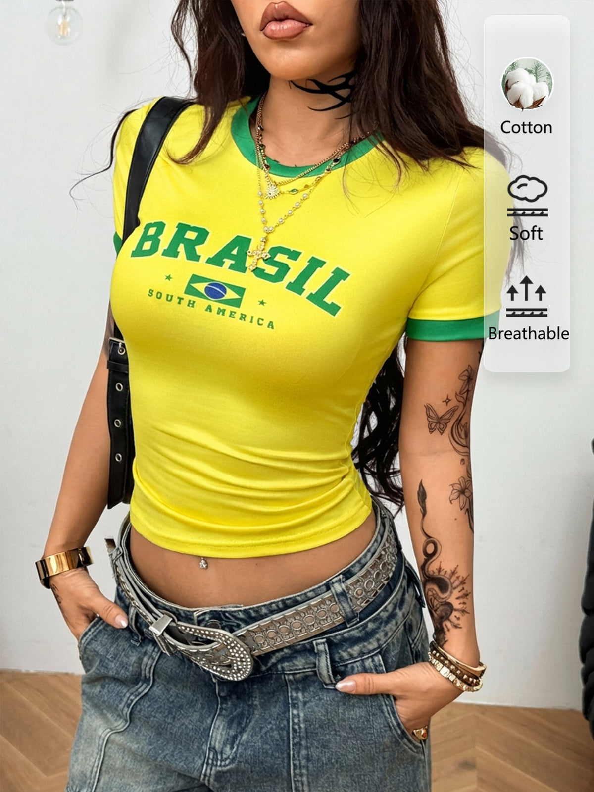 Women's slim fit short sleeve graphic jersey style top with contrast binding and round neckline