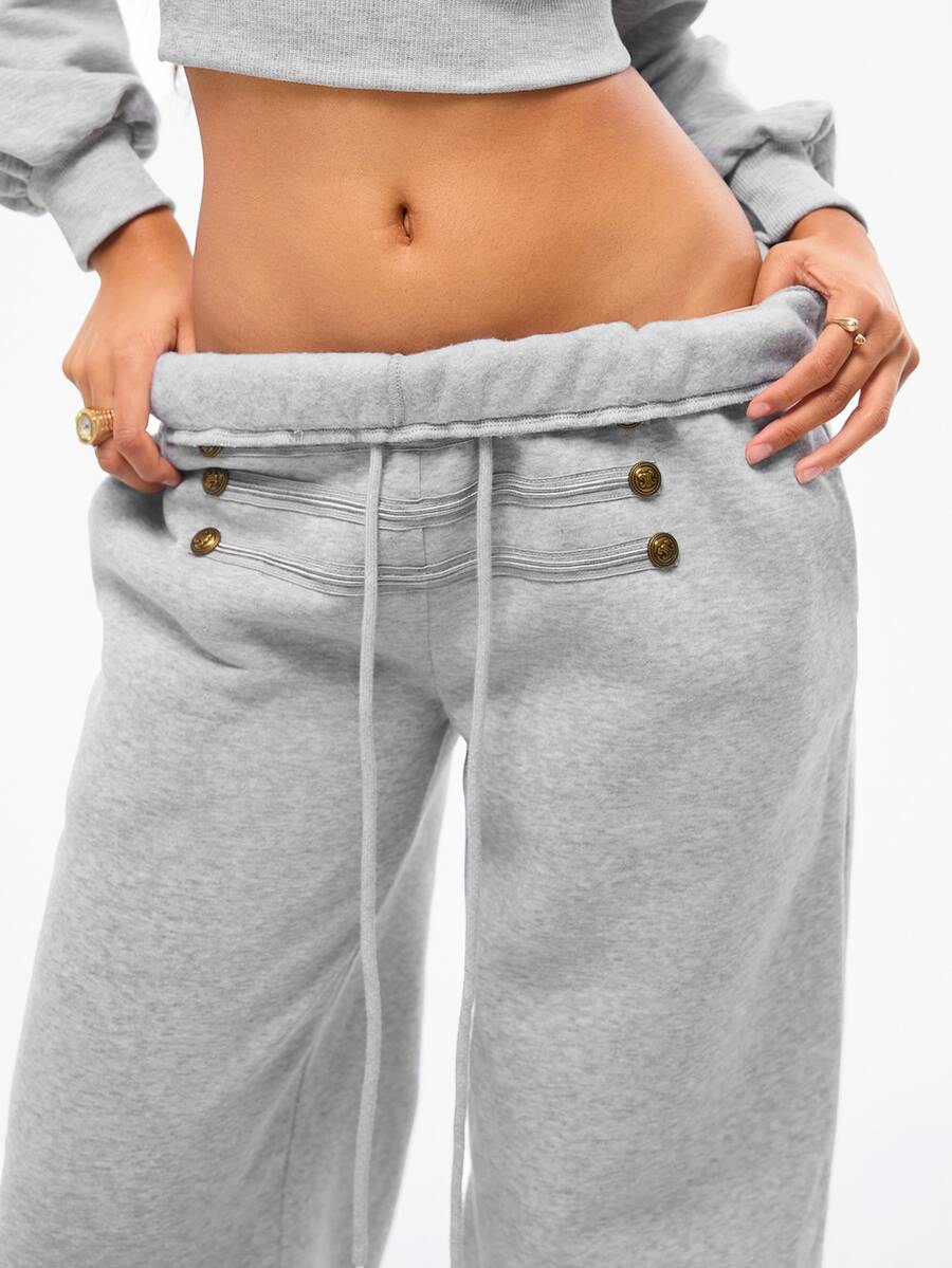 Women's wide leg trousers with a tree branch graphic pattern, loose fit, and mid-rise waist in woven fabric.