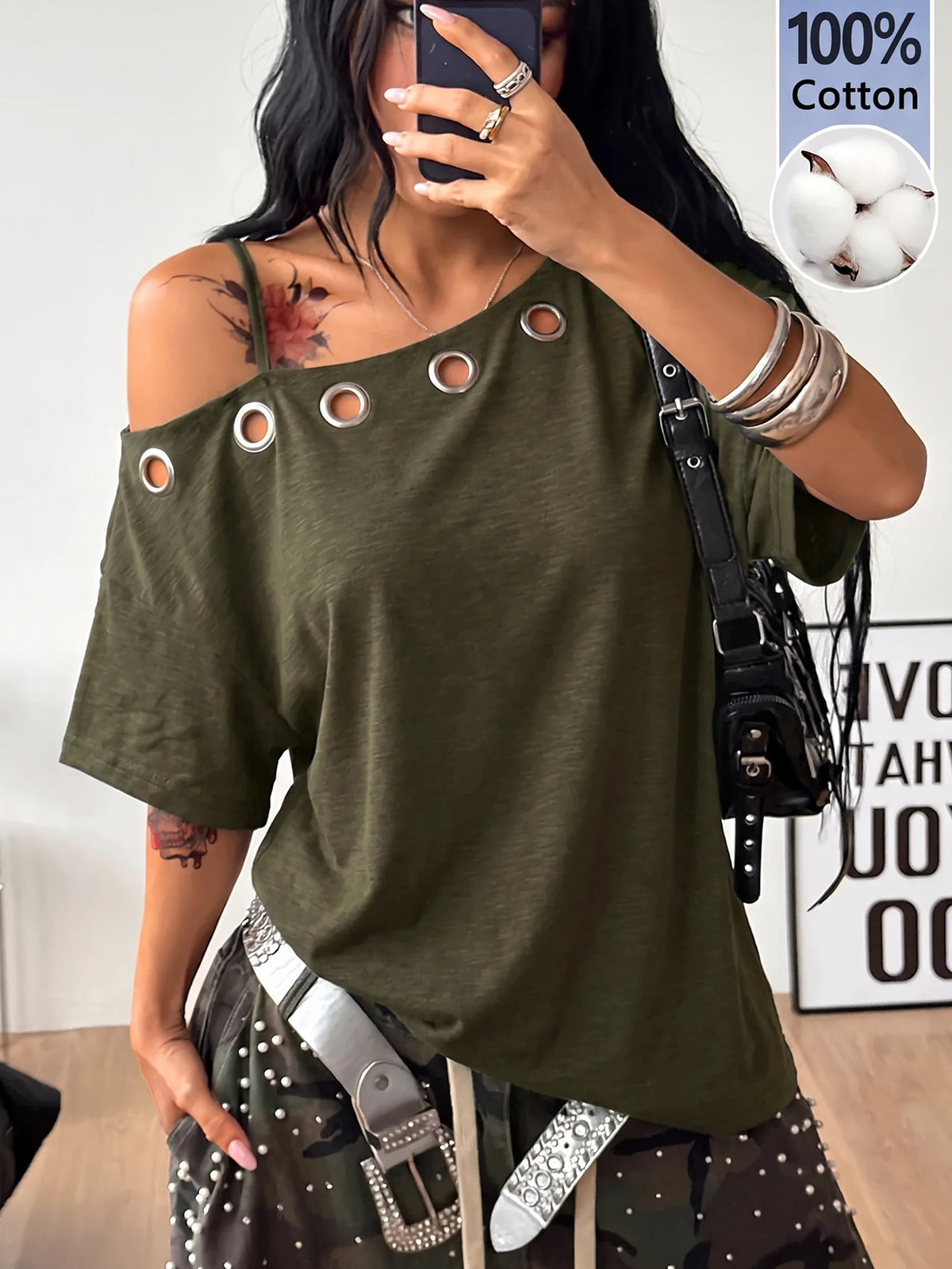 Women's casual loose fit cold shoulder cotton t-shirt with asymmetrical cutout neckline and short sleeves.