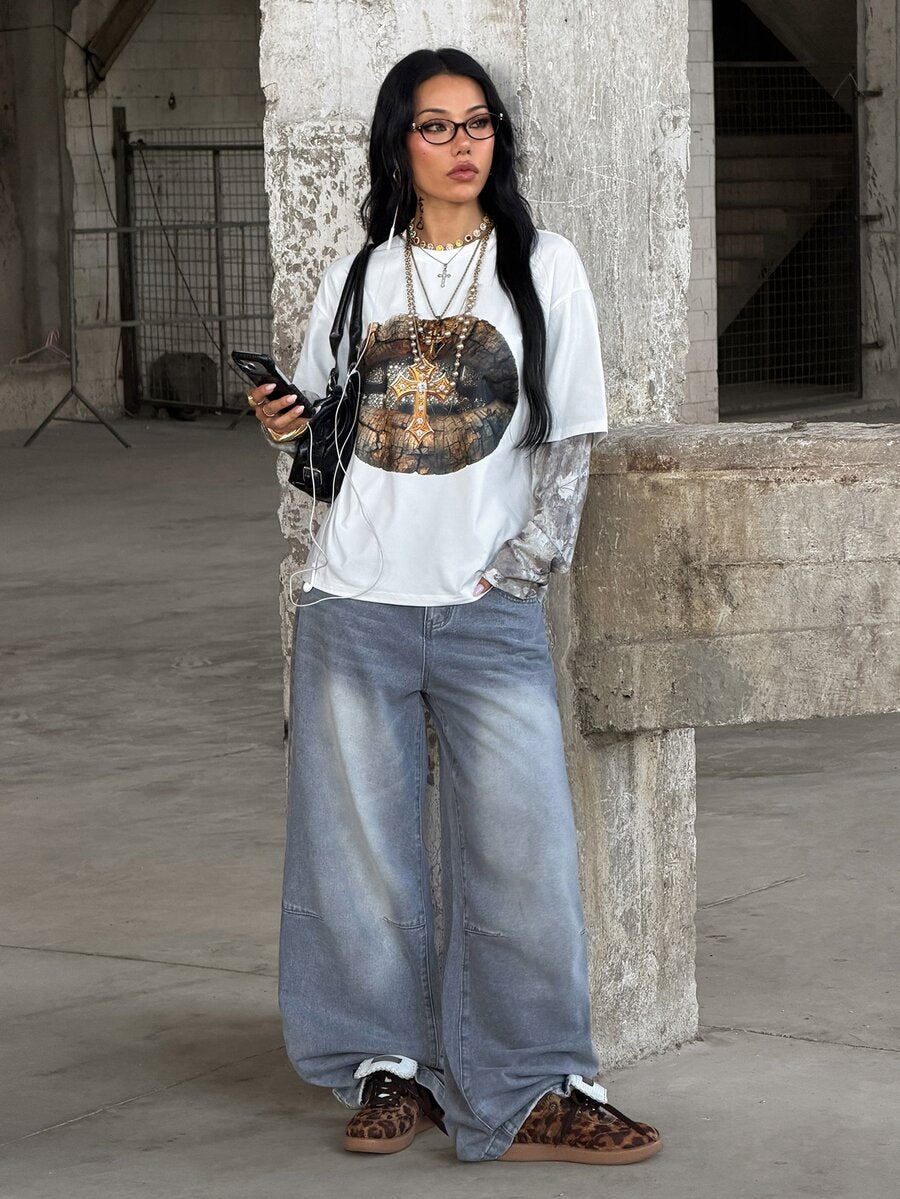 Women's casual graphic long sleeve t-shirt with a round neck, drop shoulder sleeves, and loose relaxed fit.