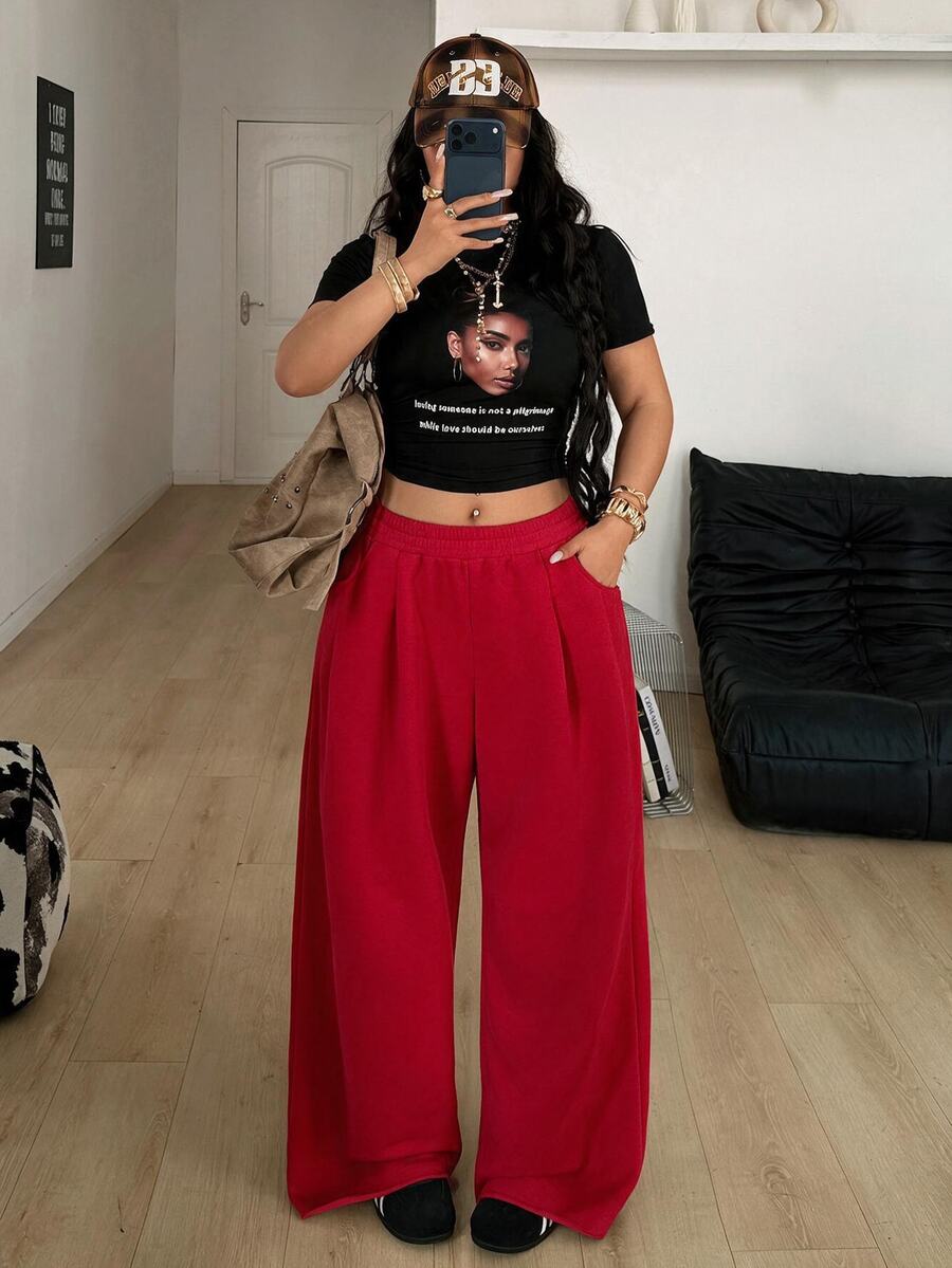 Women's loose wide leg casual sweatpants with an elastic waistband and side pockets