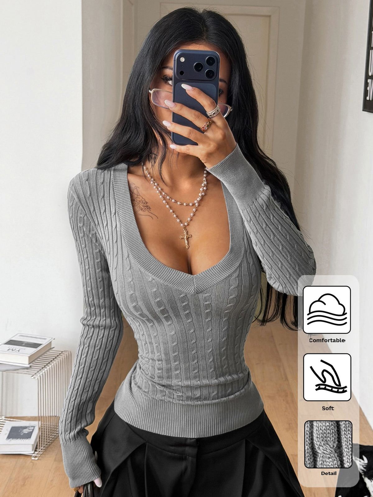 Women's slim fit cable-knit sweater with a V-neckline and long sleeves in solid green rib knit fabric.