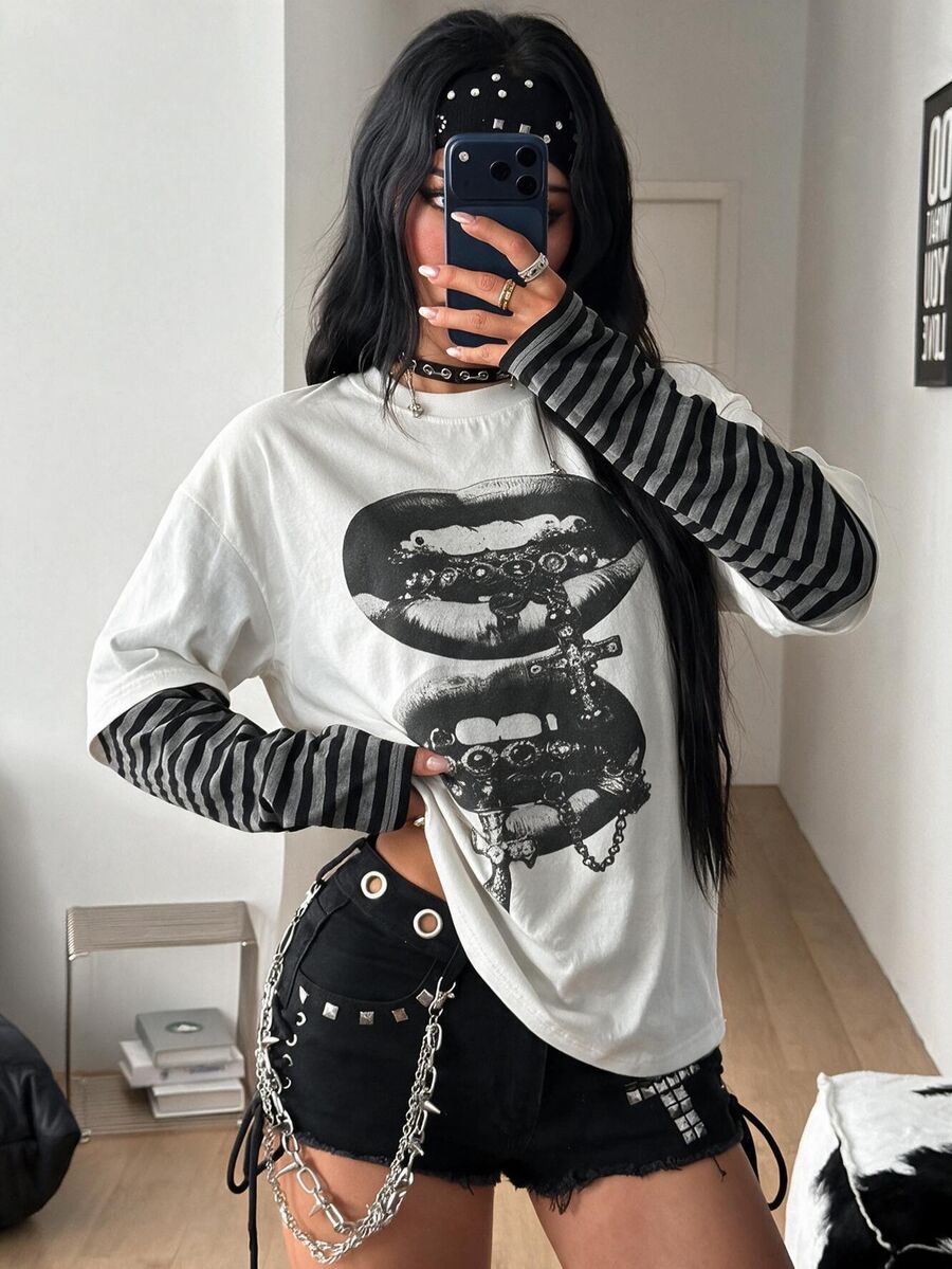 Women's casual graphic long sleeve t-shirt with a round neck, drop shoulder sleeves, and loose relaxed fit.