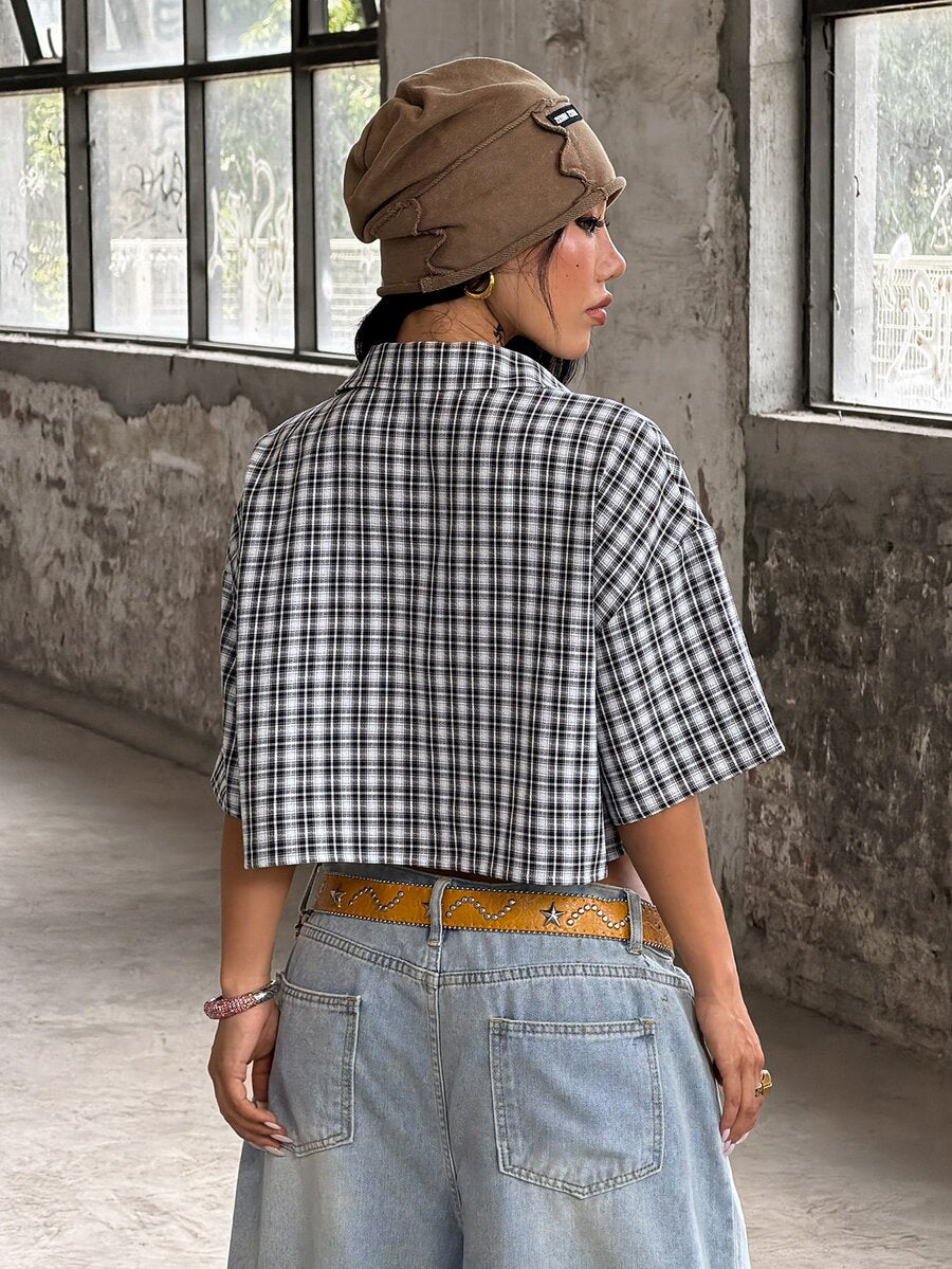 Women's plaid crop shirt with button front, chest pocket, short sleeves, and loose casual fit.