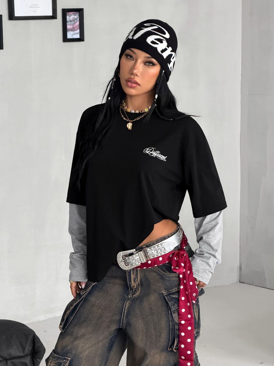 Women's casual graphic long sleeve t-shirt with a round neck, drop shoulder sleeves, and loose relaxed fit.