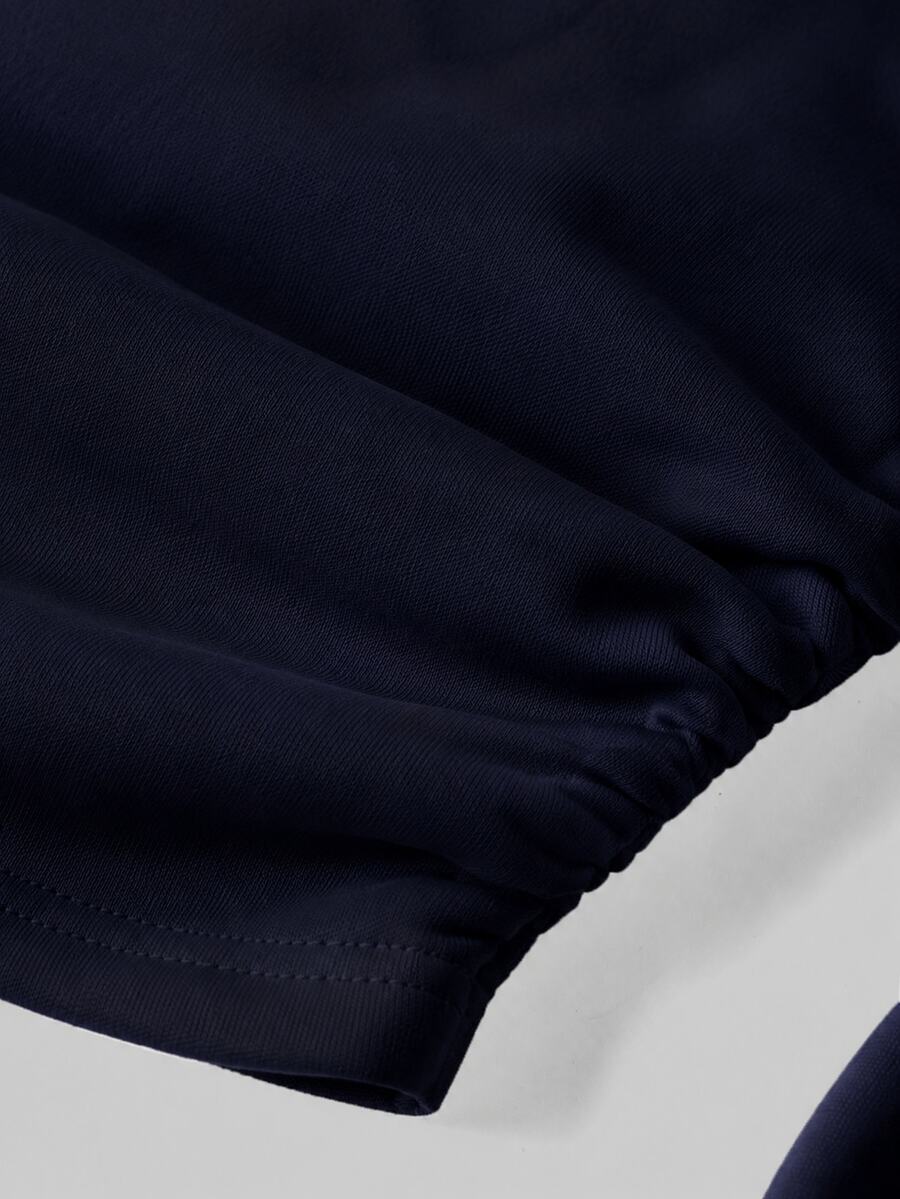 Women's brown waist-cinching sweatshirt featuring a round neck, drop shoulder long sleeves, and rib-knit cuffs.