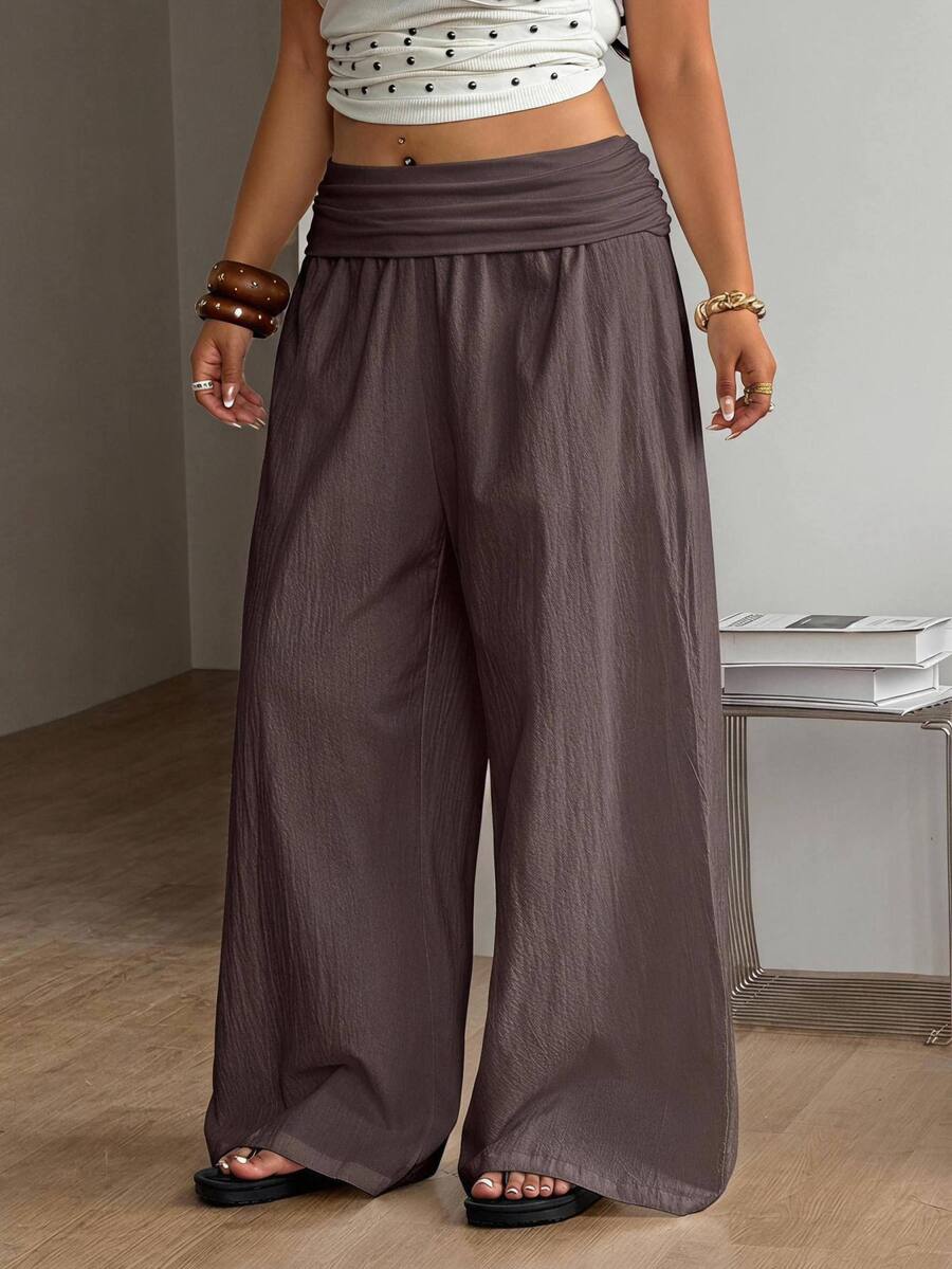 Women's plus size wide leg cotton pants featuring a relaxed loose fit and high waist design.