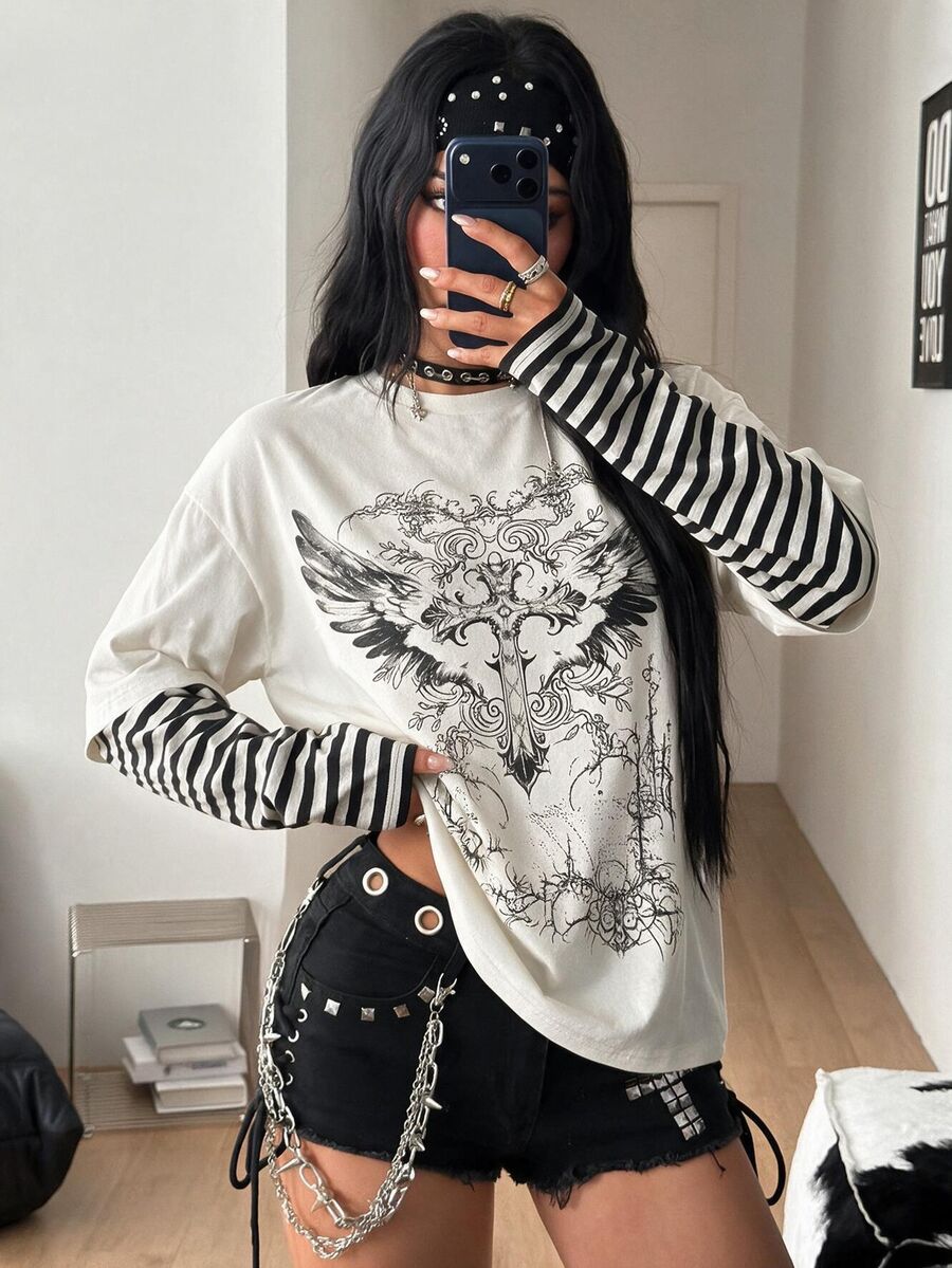 Women's casual graphic long sleeve t-shirt with a round neck, drop shoulder sleeves, and loose relaxed fit.