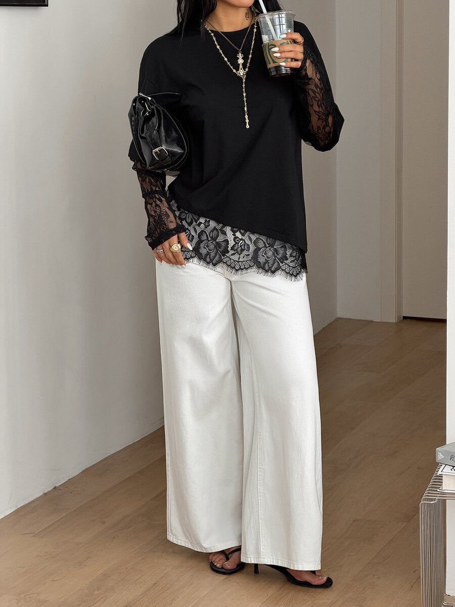 Women's casual graphic long sleeve t-shirt with a round neck, drop shoulder sleeves, and loose relaxed fit.